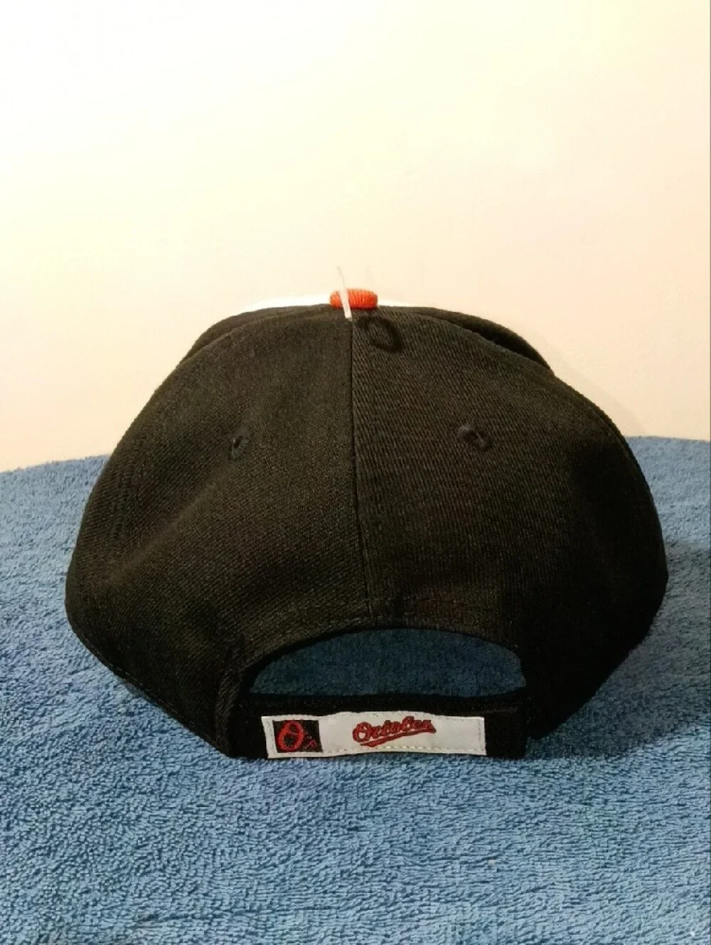 New Era Orioles 9FORTY Cap in White, Black, Orange